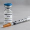 Hexarelin peptide vial by Real Peptide Shop on white background